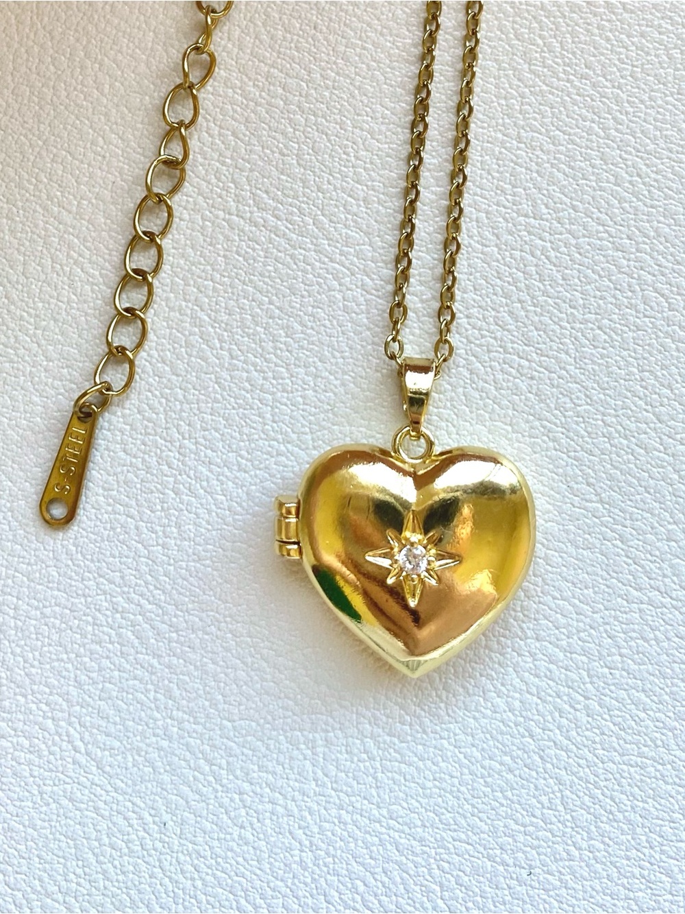 Gold Heart Locket Necklace with Sparkling Star Accen